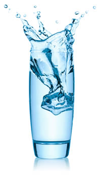 Photograph of a glass of water, which is important to have with you when having a hot bath.