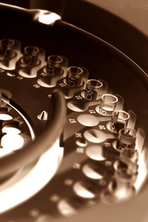 Artful sepia-toned picture of part of a centrifuge used to make platelet rich plasma.