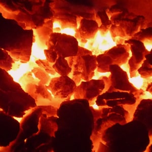 Close-up photograph of hot coals.