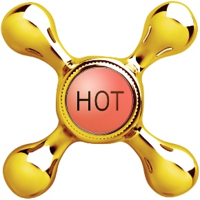 Vintage faucet handle labelled with “hot.”