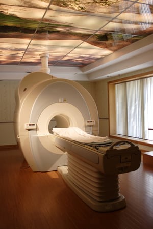 Photograph of an MRI machine in a luxurious modern clinic.