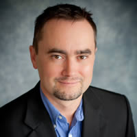 Headshot of Paul Ingraham, short hair, neat beard, suit jacket.
