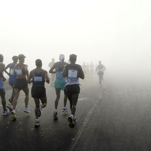 Photos of runners in the mist. Repetitive strain injuries can afflict almost anyone, but they are more common in runners than any other group of people by far.