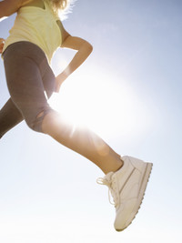 Runners legs in the sunshine.