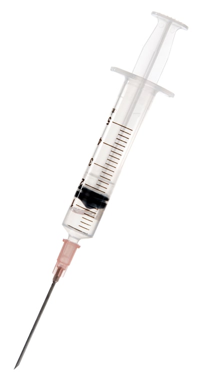 Photo of a syringe, isolated on white.